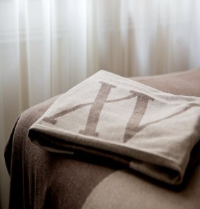 Fifteen Beacon Logo on our cashmere throws that come from Milan.