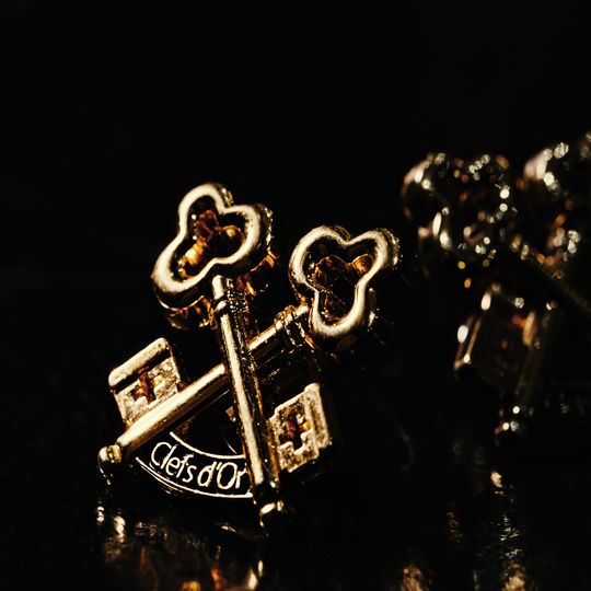 Photograph of our concierge gold keys.