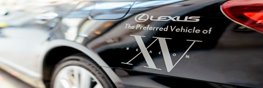 Lexus logo alongside the fifteen beacon logo that is on each our our house cars
