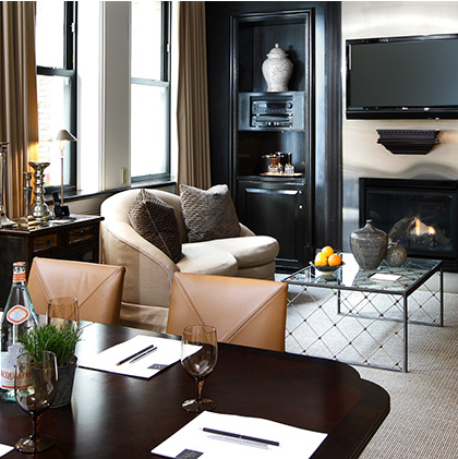 Parlor Room- Approximately 485 square feet. Perfect area for a meeting of up to 12 people. Large sitting area, grand mahogany table, private bathroom, natural light and windows that open and allow for fresh air. Highspeed Internet (complimentary), 42” flat screen LCD TV, and fireplace.