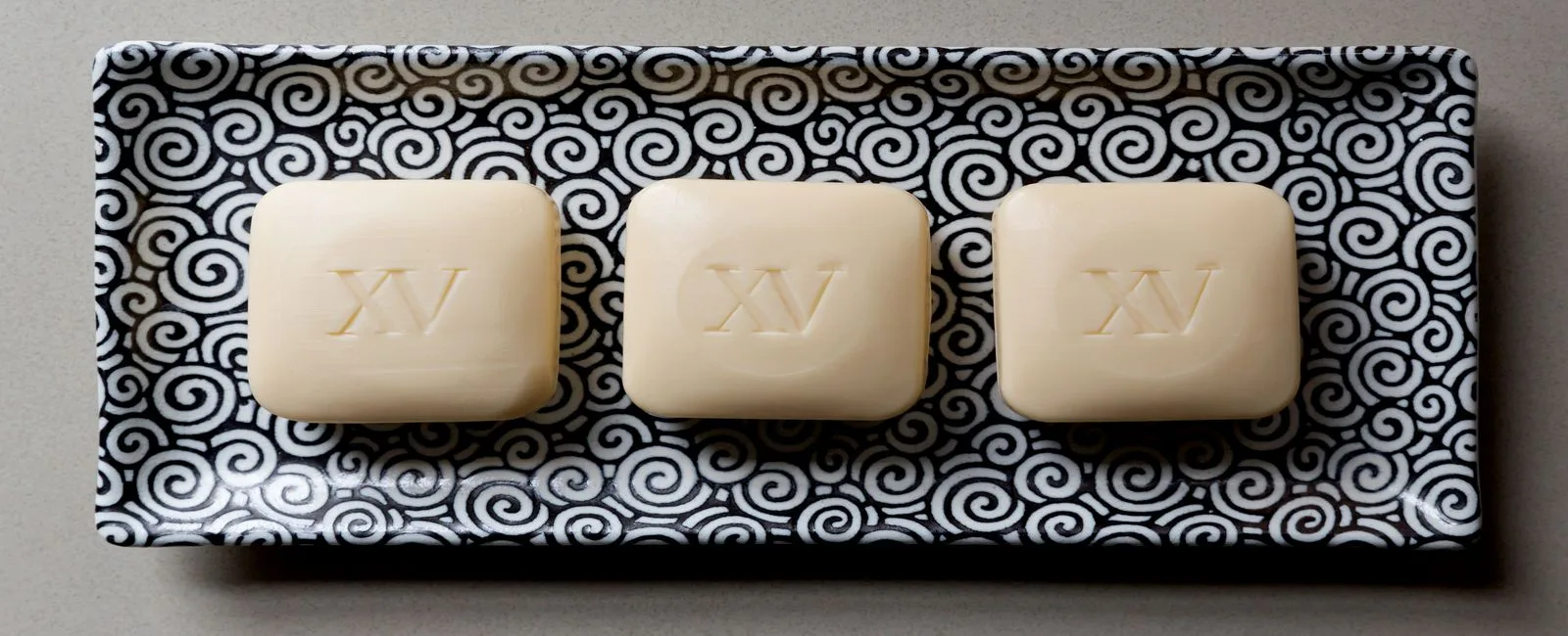 fifteen beacon branded soap bars.