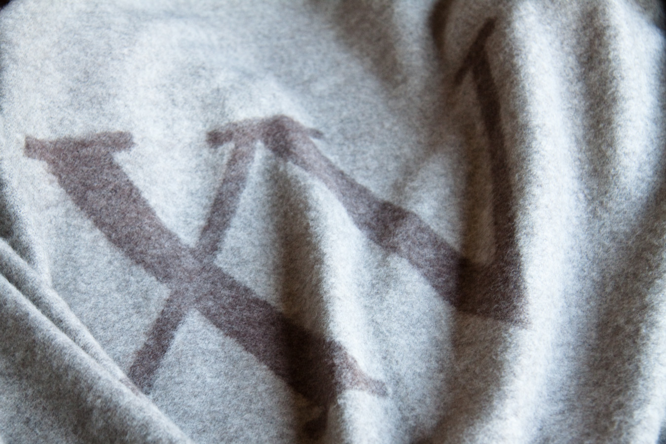 Fifteen Beacon Logo on our cashmere throws that come from Milan.