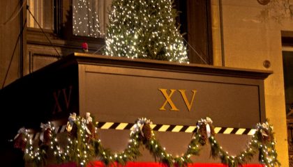 holiday decorations to the exterior of the XV Beacon hotel during christmas