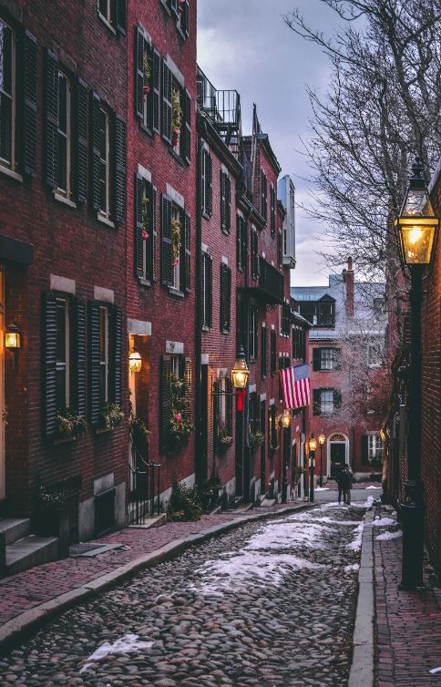 snow covered cobblestone street in Beacon Hill, MA