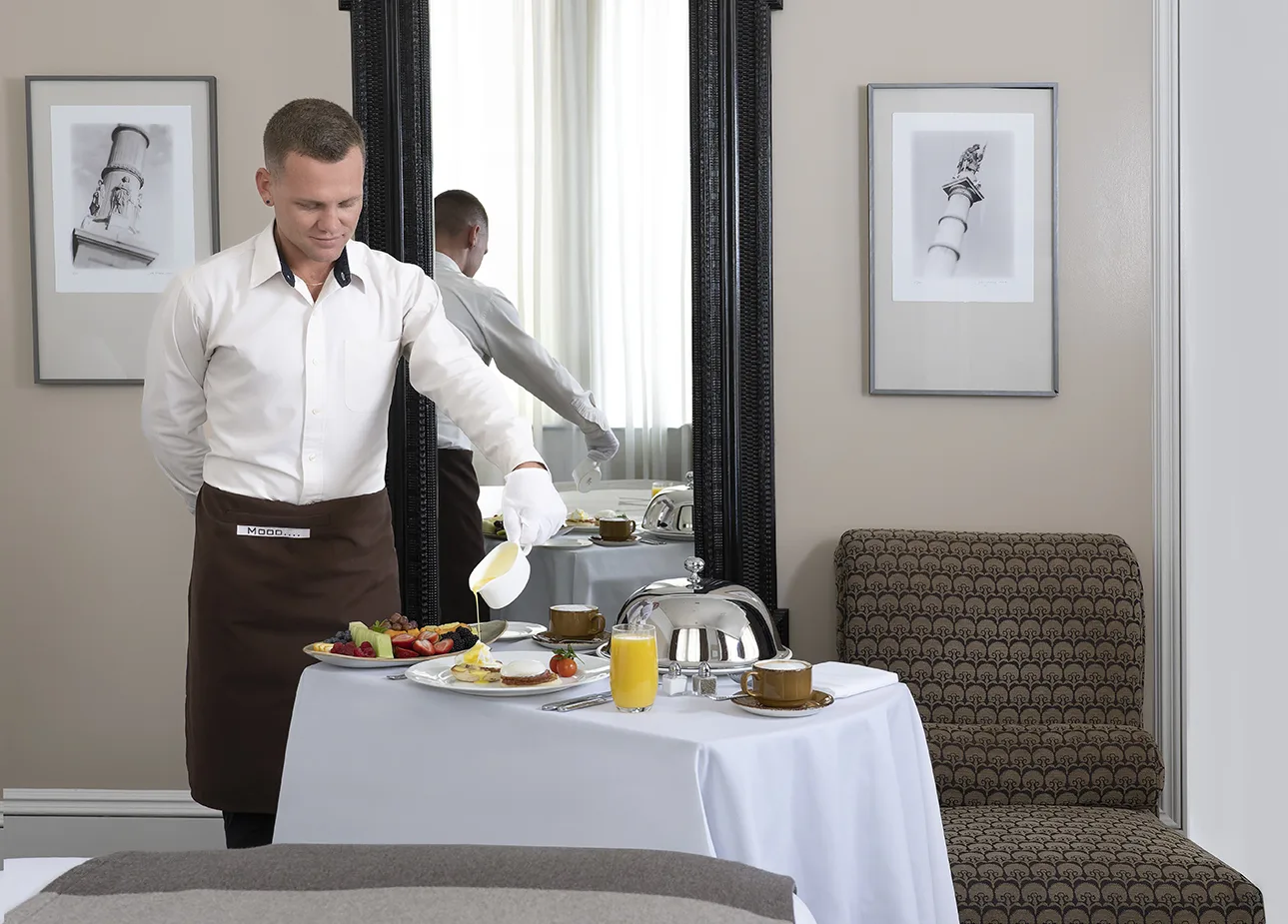 Parker, Hotel employee delivering a room service breakfast order